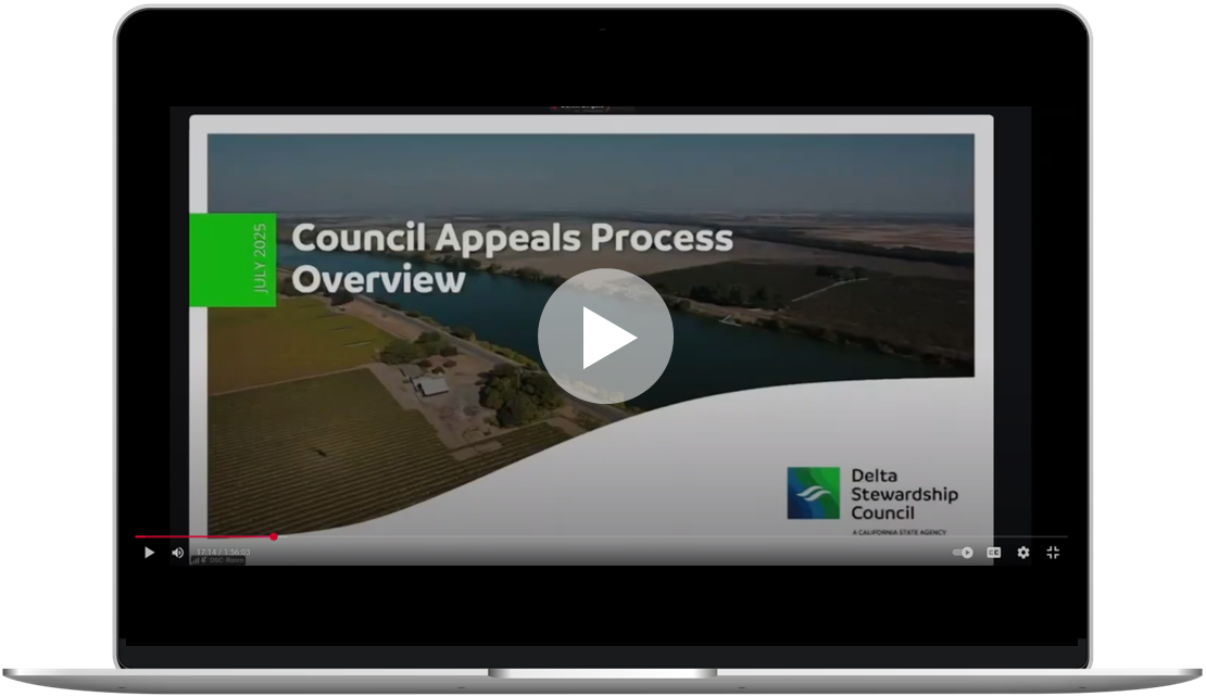 A picture of a laptop that has a YouTube video about the Delta Stewardship Council's Delta Plan covered action appeals process.